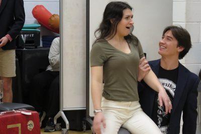 Luke Dangle, a senior theatre major, and Virginia Ames Tillar, a junior double major in theatre and English literature, rehearse a scene between Petruchio and Kate.  Virginia Ames Tillar sits on Luke's knee, as he holds her arm.